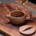 Handmade rough pottery tea pot